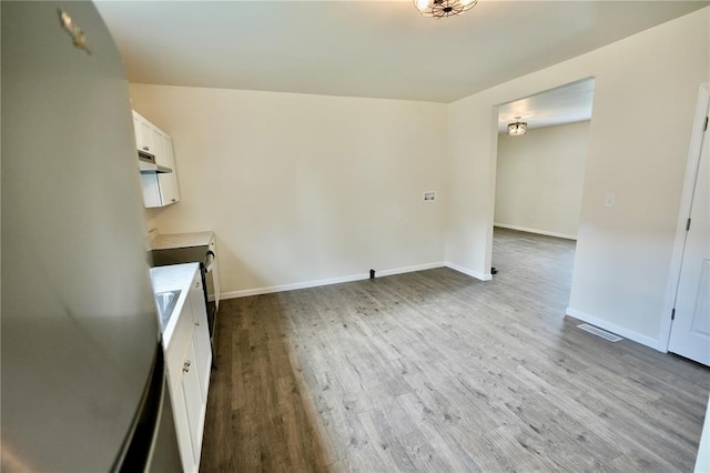 300 W Baker St, Gillespie, IL 62033 - interior space featuring wood finished floors and baseboards