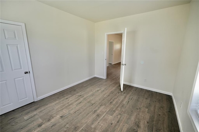 300 W Baker St, Gillespie, IL 62033 - unfurnished room featuring wood finished floors and baseboards