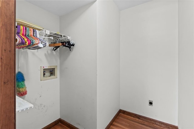 102 S Willow Grove Ct, Saint Peters, MO 63376 - washroom with hookup for an electric dryer, hookup for a washing machine, wood finished floors, and baseboards