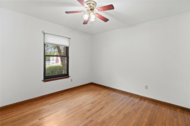 102 S Willow Grove Ct, Saint Peters, MO 63376 - unfurnished room featuring light wood finished floors, a ceiling fan, and baseboards