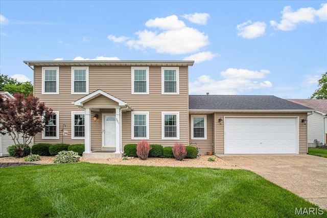 301 Sassafras Parc Dr, Ofallon, MO 63368 - colonial house with concrete driveway, a front lawn, and an attached garage