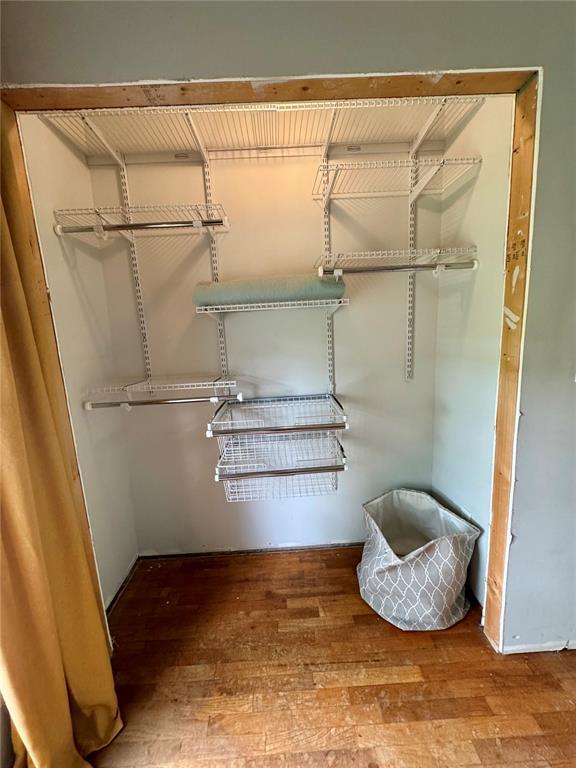 10321 Old 79, Hannibal, MO 63401 - walk in closet with hardwood / wood-style flooring