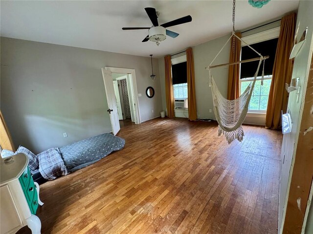 10321 Old 79, Hannibal, MO 63401 - unfurnished room featuring plenty of natural light, hardwood / wood-style floors, and a ceiling fan