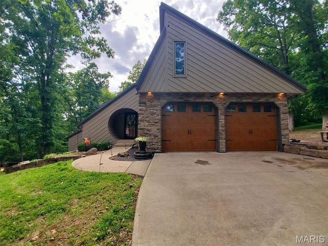 3 Janney Cir, Canton, MO 63435 - view of front of home featuring concrete driveway and stone siding