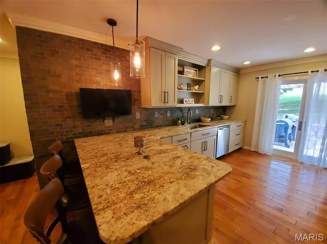 3 Janney Cir, Canton, MO 63435 - kitchen with a sink, open shelves, light stone countertops, hanging light fixtures, and stainless steel dishwasher