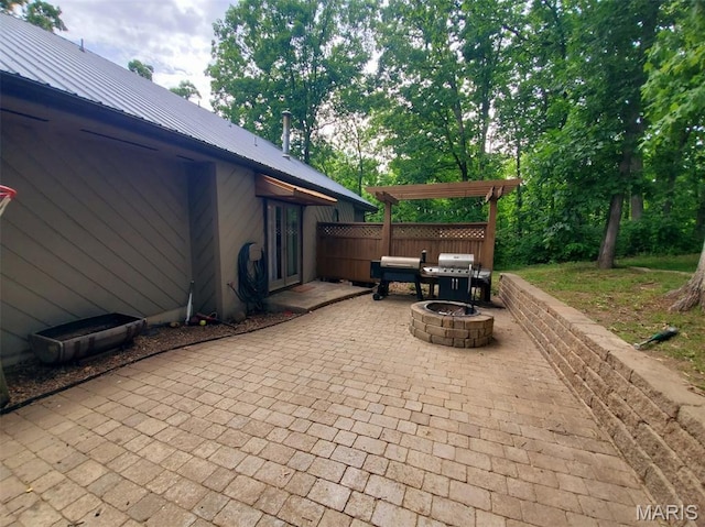 3 Janney Cir, Canton, MO 63435 - view of patio / terrace featuring a fire pit