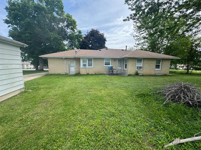 511 N 5th St, La Grange, MO 63448 - rear view of house with a lawn and a patio area