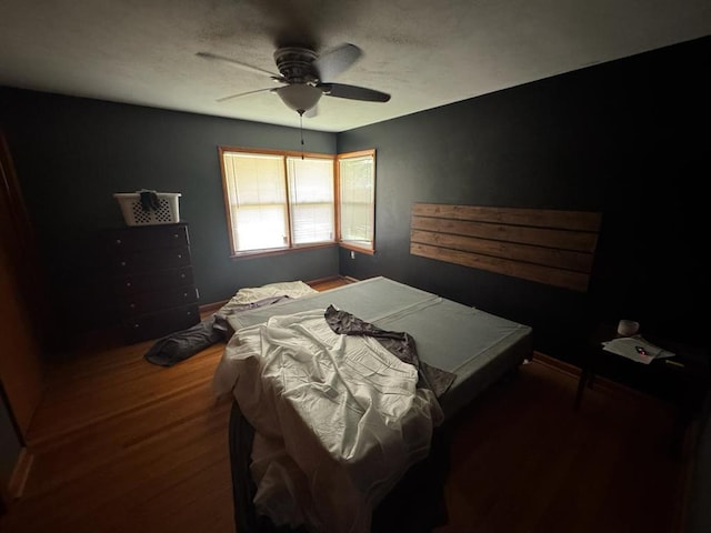 511 N 5th St, La Grange, MO 63448 - bedroom with wood finished floors and a ceiling fan