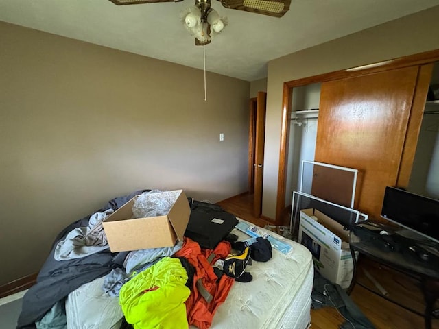 511 N 5th St, La Grange, MO 63448 - bedroom featuring a closet, a ceiling fan, attic access, and wood finished floors