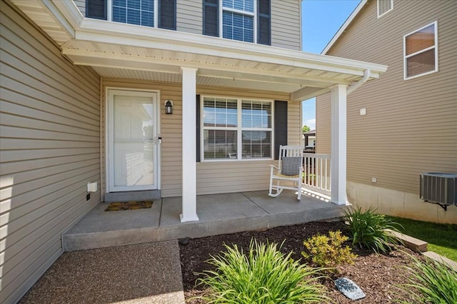 1406 Tisbury Cir, Ofallon, MO 63366 - view of exterior entry with covered porch and cooling unit