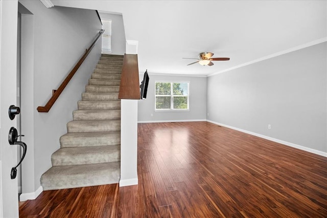 1406 Tisbury Cir, Ofallon, MO 63366 - stairs featuring ceiling fan, baseboards, wood finished floors, and ornamental molding