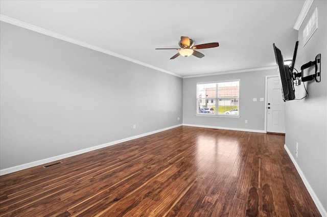1406 Tisbury Cir, Ofallon, MO 63366 - spare room featuring a ceiling fan, crown molding, dark wood finished floors, and baseboards