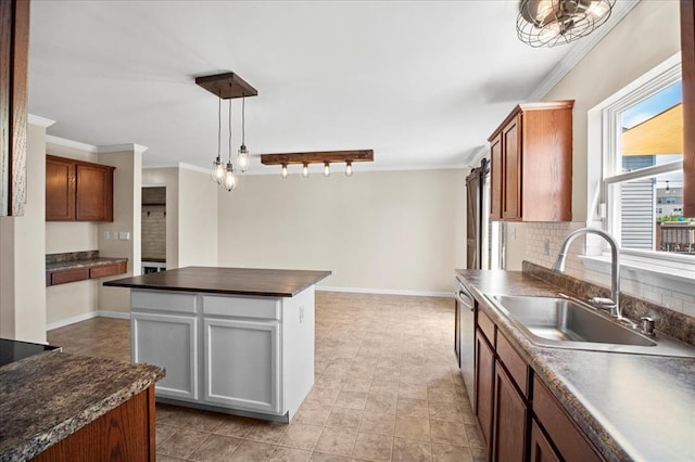 1406 Tisbury Cir, Ofallon, MO 63366 - kitchen featuring a sink, ornamental molding, dishwasher, a center island, and decorative backsplash