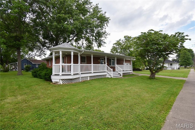 411 S Walnut St, Mount Olive, IL 62069 - view of front of house with a porch, a front yard, and brick siding