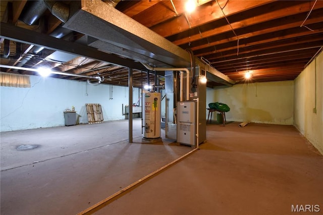 411 S Walnut St, Mount Olive, IL 62069 - unfinished basement featuring water heater and heating unit