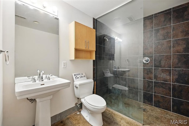 1312 Washington Ave Unit 2A, Saint Louis, MO 63103 - full bath featuring toilet and a tile shower