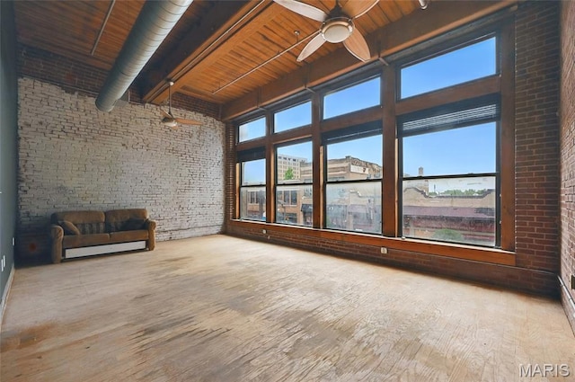 1312 Washington Ave Unit 2A, Saint Louis, MO 63103 - unfurnished sunroom with beamed ceiling