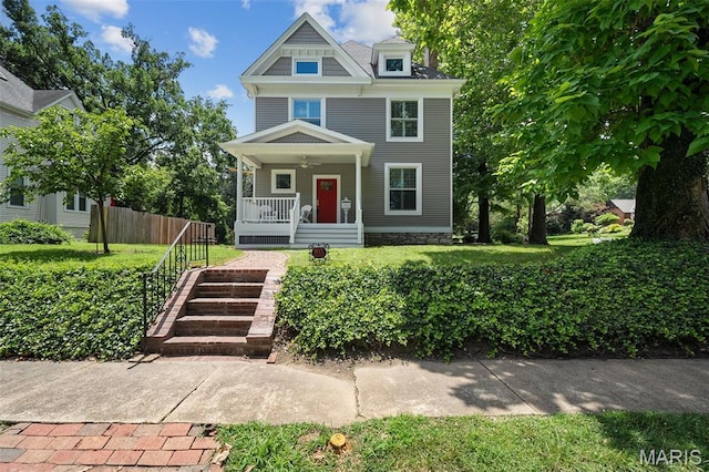 102 Portland Ter, Webster Groves, MO 63119 - view of front of house featuring a porch, a ceiling fan, and a front lawn