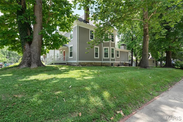 102 Portland Ter, Webster Groves, MO 63119 - traditional style home featuring a chimney and a front lawn