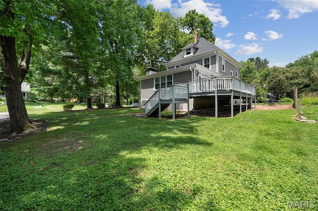 102 Portland Ter, Webster Groves, MO 63119 - back of property featuring stairs, a lawn, a chimney, and a deck