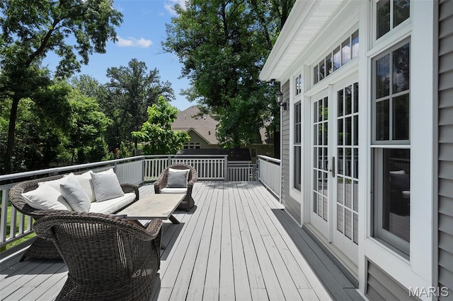 102 Portland Ter, Webster Groves, MO 63119 - wooden deck with an outdoor living space and french doors