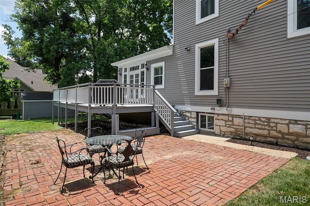 102 Portland Ter, Webster Groves, MO 63119 - view of patio / terrace featuring a wooden deck, stairs, and outdoor dining area