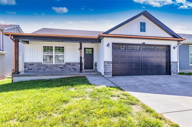 312 Andy Habsieger St, Festus, MO 63028 - view of front of house with stone siding, an attached garage, and concrete driveway