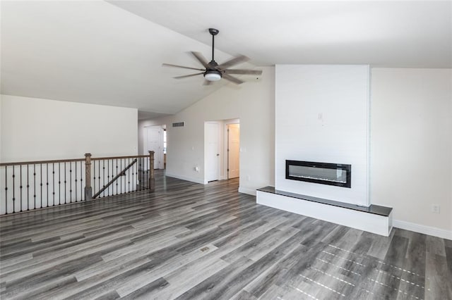 312 Andy Habsieger St, Festus, MO 63028 - unfurnished living room featuring ceiling fan, a fireplace, wood finished floors, baseboards, and high vaulted ceiling