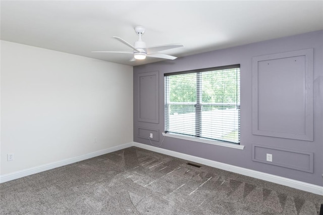 312 Andy Habsieger St, Festus, MO 63028 - unfurnished room featuring baseboards, dark colored carpet, and ceiling fan