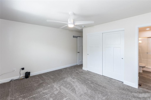 312 Andy Habsieger St, Festus, MO 63028 - unfurnished bedroom with carpet, a closet, baseboards, connected bathroom, and a ceiling fan