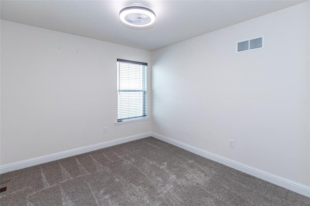 312 Andy Habsieger St, Festus, MO 63028 - spare room with dark carpet and baseboards
