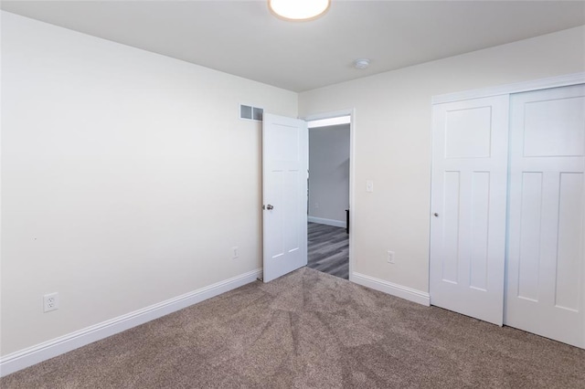 312 Andy Habsieger St, Festus, MO 63028 - unfurnished bedroom with carpet floors, baseboards, and a closet