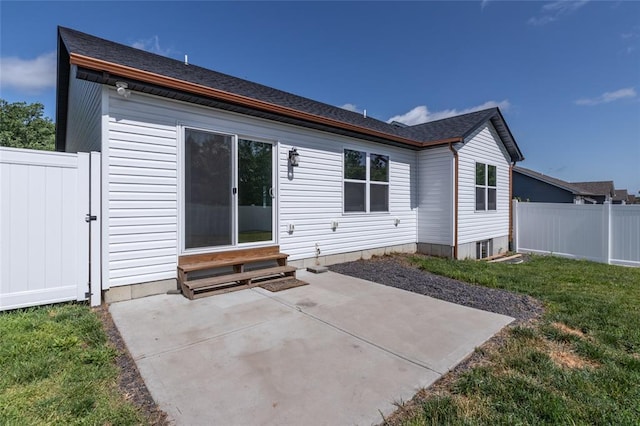 312 Andy Habsieger St, Festus, MO 63028 - back of house with entry steps, a patio area, and a shingled roof