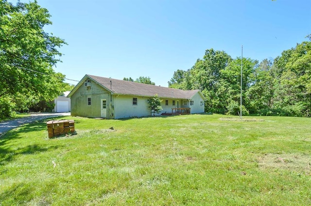 4090 E Pelot Ln, Alton, IL 62002 - view of grassy yard featuring an outdoor structure and a garage