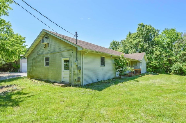 4090 E Pelot Ln, Alton, IL 62002 - view of property exterior featuring a yard and a wall mounted air conditioner