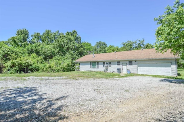4090 E Pelot Ln, Alton, IL 62002 - ranch-style home featuring a garage and driveway