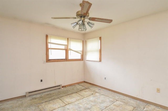 4090 E Pelot Ln, Alton, IL 62002 - unfurnished room with a baseboard heating unit, baseboards, and a ceiling fan