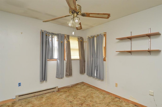 4090 E Pelot Ln, Alton, IL 62002 - spare room with a baseboard radiator, ceiling fan, carpet, and baseboards