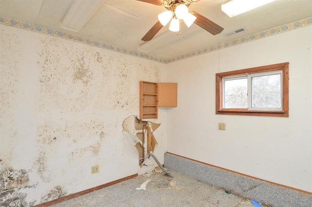 4090 E Pelot Ln, Alton, IL 62002 - spare room with carpet, baseboards, and a ceiling fan