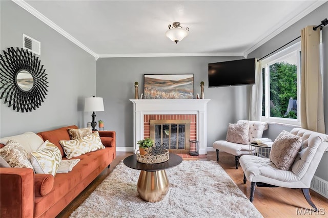 804 Tavalon Ave, Rock Hill, MO 63119 - living area featuring crown molding, wood finished floors, and a brick fireplace