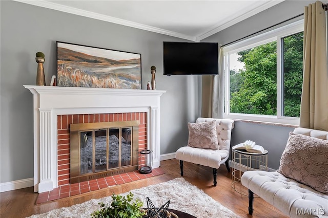804 Tavalon Ave, Rock Hill, MO 63119 - living room with a brick fireplace, ornamental molding, and wood finished floors