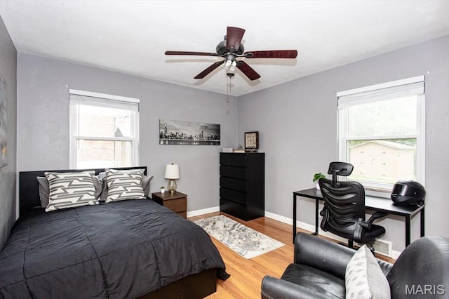 804 Tavalon Ave, Rock Hill, MO 63119 - bedroom with wood finished floors and ceiling fan