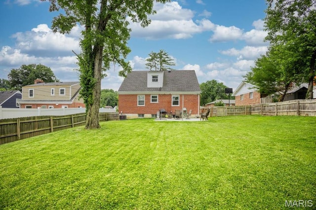 804 Tavalon Ave, Rock Hill, MO 63119 - back of house with a patio area, a fenced backyard, and brick siding