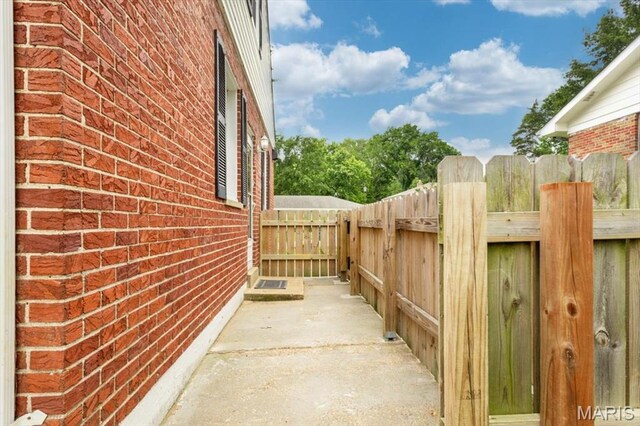 804 Tavalon Ave, Rock Hill, MO 63119 - view of side of property with brick siding