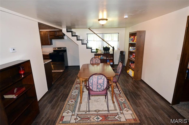 1116 E Springfield Rd, Sullivan, MO 63080 - dining area featuring dark wood finished floors and stairs