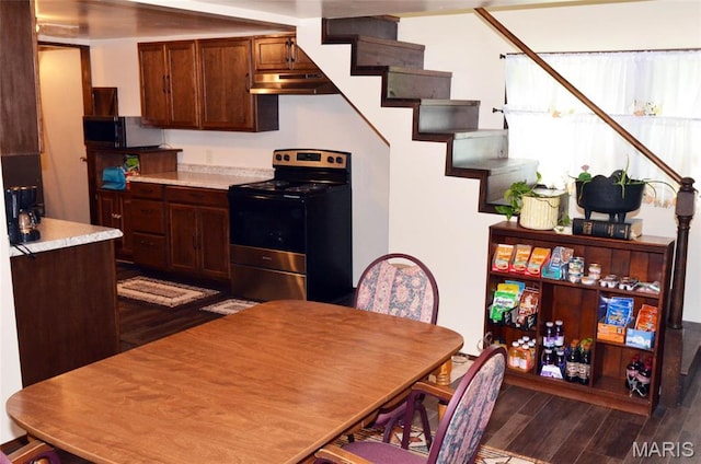 1116 E Springfield Rd, Sullivan, MO 63080 - kitchen featuring electric range, under cabinet range hood, dark wood-style floors, and light countertops