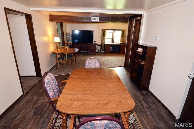 1116 E Springfield Rd, Sullivan, MO 63080 - dining area featuring dark wood finished floors and baseboards