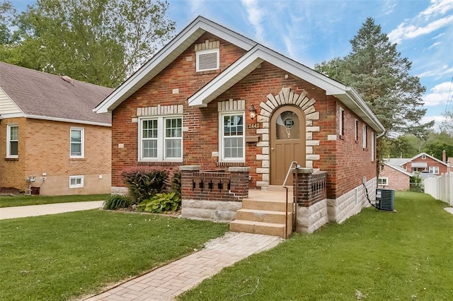 2447 Hartland Ave, Sycamore Hills, MO 63114 - view of front of house with brick siding and central AC