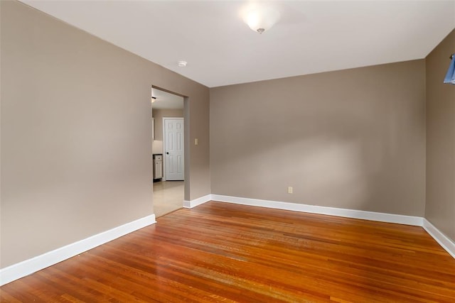 2447 Hartland Ave, Sycamore Hills, MO 63114 - spare room featuring wood finished floors and baseboards