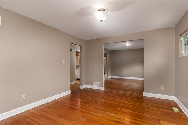 2447 Hartland Ave, Sycamore Hills, MO 63114 - empty room with ceiling fan, wood finished floors, and baseboards